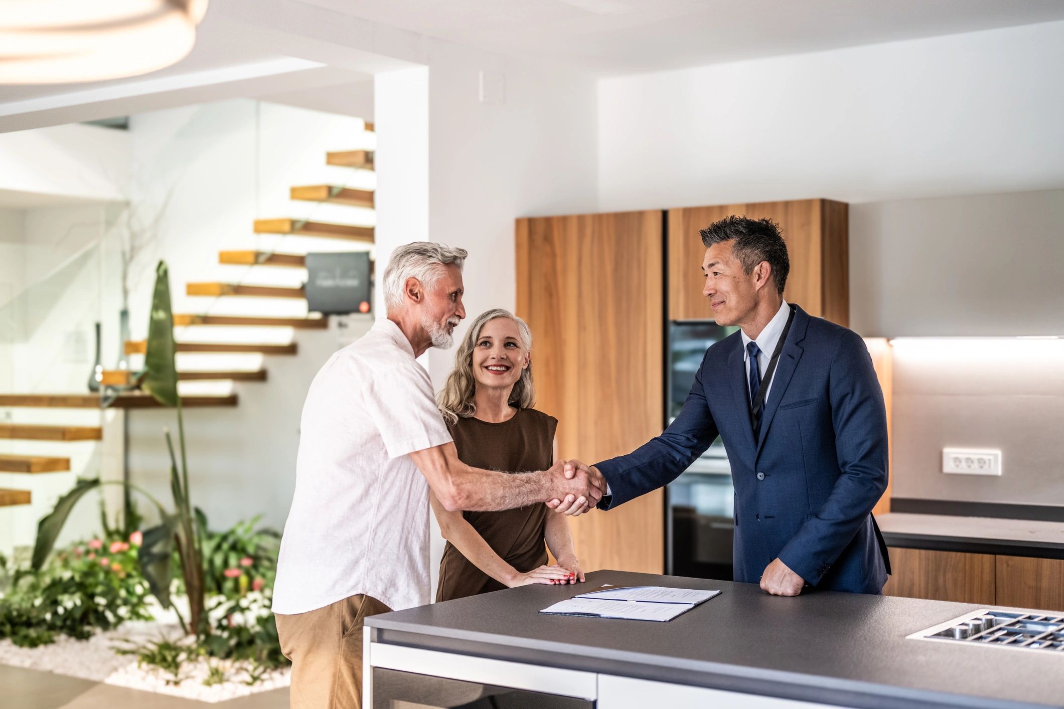 Clients meeting with a real estate agent